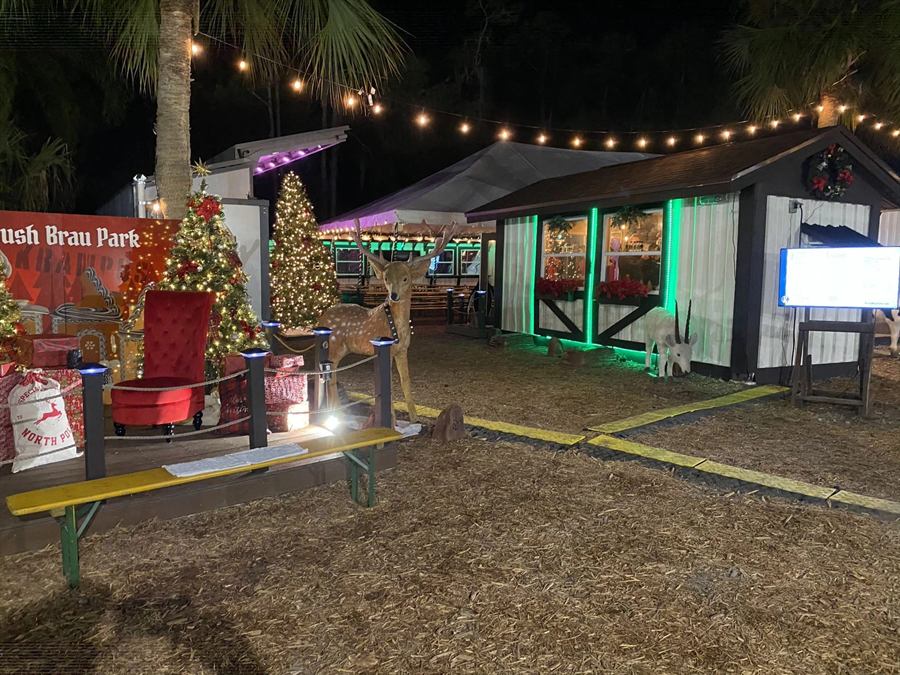 Outdoor beer garden at Krush Brau Park under string lights at night